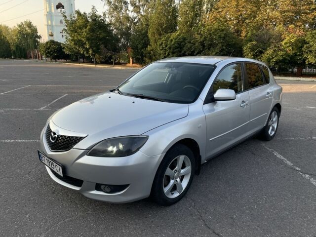 Серый Мазда 3, объемом двигателя 1.6 л и пробегом 310 тыс. км за 3751 $, фото 1 на Automoto.ua