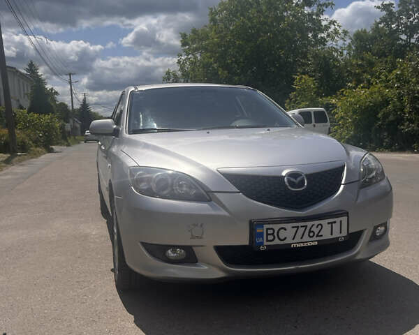 Серый Мазда 3, объемом двигателя 1.6 л и пробегом 262 тыс. км за 4000 $, фото 1 на Automoto.ua