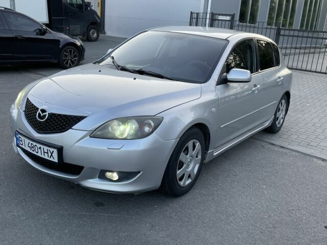 Сірий Мазда 3, об'ємом двигуна 1.6 л та пробігом 259 тис. км за 4497 $, фото 1 на Automoto.ua