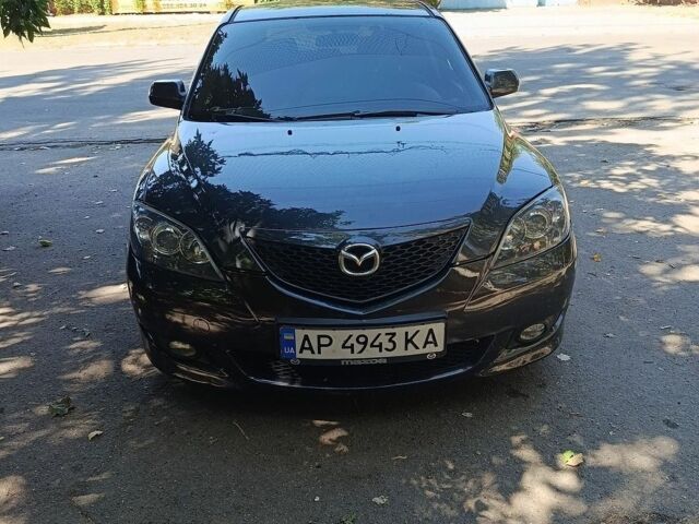 Серый Мазда 3, объемом двигателя 1.6 л и пробегом 247 тыс. км за 5009 $, фото 1 на Automoto.ua