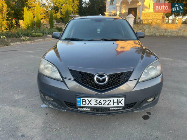 Серый Мазда 3, объемом двигателя 2 л и пробегом 300 тыс. км за 6500 $, фото 1 на Automoto.ua