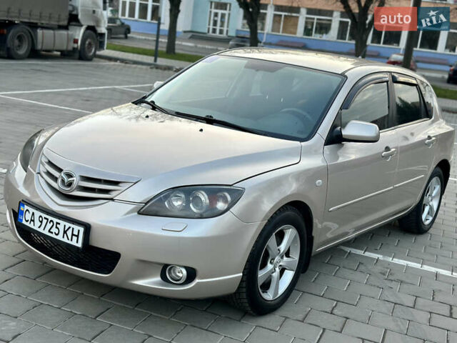 Серый Мазда 3, объемом двигателя 2 л и пробегом 220 тыс. км за 4300 $, фото 1 на Automoto.ua