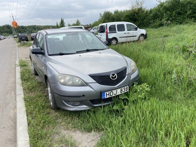 Серый Мазда 3, объемом двигателя 1.6 л и пробегом 234 тыс. км за 1750 $, фото 1 на Automoto.ua