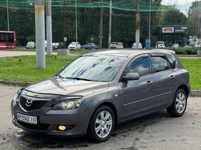 Серый Мазда 3, объемом двигателя 1.6 л и пробегом 217 тыс. км за 4950 $, фото 1 на Automoto.ua
