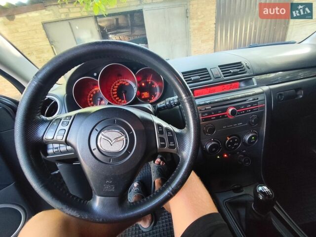 Серый Мазда 3, объемом двигателя 2 л и пробегом 221 тыс. км за 4900 $, фото 1 на Automoto.ua