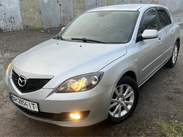 Серый Мазда 3, объемом двигателя 1.6 л и пробегом 313 тыс. км за 5400 $, фото 1 на Automoto.ua
