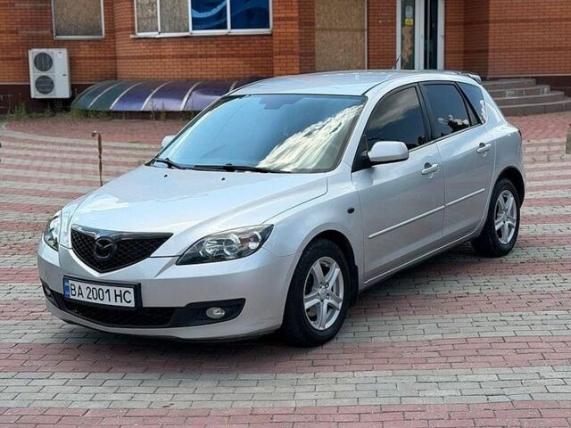 Серый Мазда 3, объемом двигателя 1.6 л и пробегом 287 тыс. км за 3999 $, фото 1 на Automoto.ua