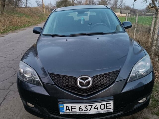 Серый Мазда 3, объемом двигателя 1.6 л и пробегом 297 тыс. км за 4600 $, фото 1 на Automoto.ua