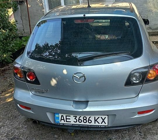 Серый Мазда 3, объемом двигателя 1.6 л и пробегом 187 тыс. км за 4600 $, фото 1 на Automoto.ua