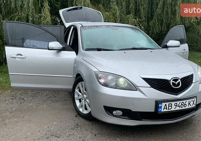 Серый Мазда 3, объемом двигателя 1.6 л и пробегом 157 тыс. км за 4950 $, фото 1 на Automoto.ua