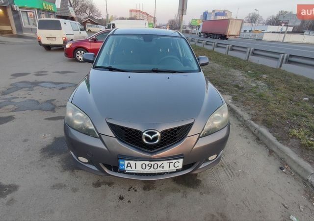 Серый Мазда 3, объемом двигателя 1.6 л и пробегом 379 тыс. км за 4300 $, фото 1 на Automoto.ua