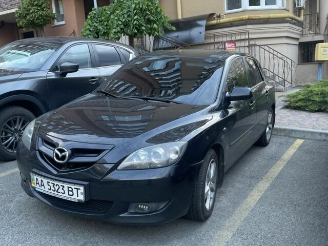 Серый Мазда 3, объемом двигателя 2 л и пробегом 240 тыс. км за 4200 $, фото 1 на Automoto.ua