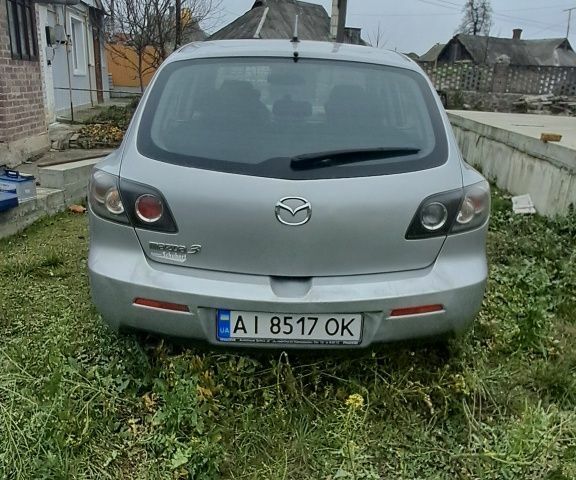 Серый Мазда 3, объемом двигателя 1.6 л и пробегом 370 тыс. км за 2200 $, фото 1 на Automoto.ua
