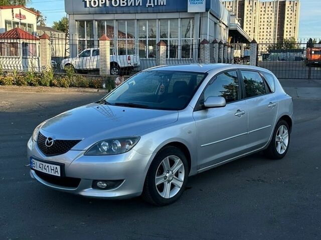 Серый Мазда 3, объемом двигателя 1.6 л и пробегом 215 тыс. км за 5200 $, фото 1 на Automoto.ua