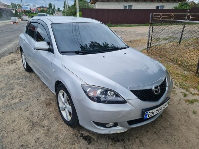 Серый Мазда 3, объемом двигателя 1.6 л и пробегом 370 тыс. км за 4338 $, фото 1 на Automoto.ua