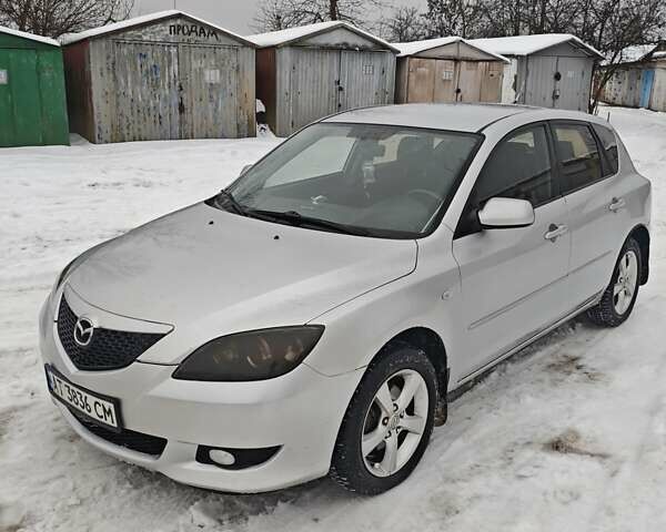 Серый Мазда 3, объемом двигателя 1.6 л и пробегом 385 тыс. км за 3700 $, фото 1 на Automoto.ua