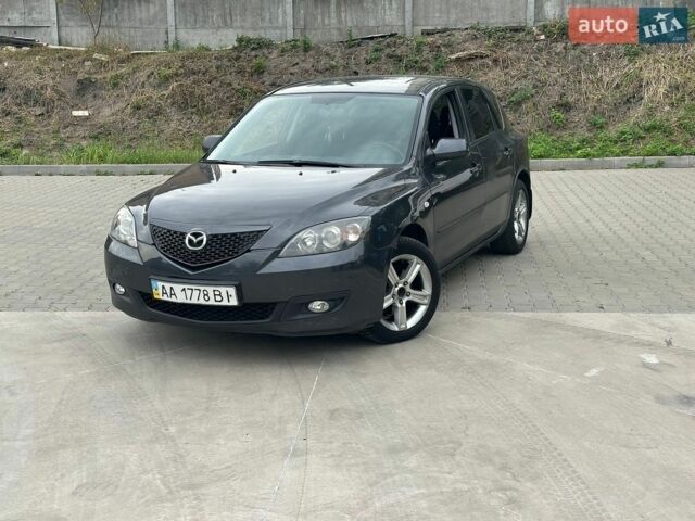 Серый Мазда 3, объемом двигателя 1.6 л и пробегом 180 тыс. км за 3800 $, фото 1 на Automoto.ua