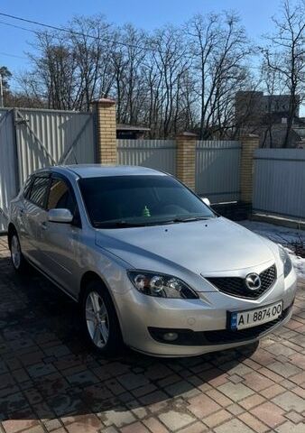 Серый Мазда 3, объемом двигателя 1.6 л и пробегом 200 тыс. км за 5600 $, фото 1 на Automoto.ua