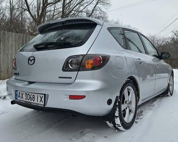 Серый Мазда 3, объемом двигателя 1.6 л и пробегом 228 тыс. км за 4499 $, фото 1 на Automoto.ua