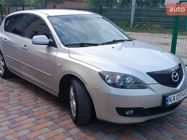 Серый Мазда 3, объемом двигателя 1.6 л и пробегом 230 тыс. км за 4150 $, фото 1 на Automoto.ua