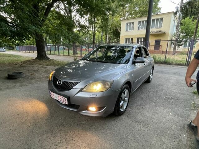 Серый Мазда 3, объемом двигателя 1.6 л и пробегом 250 тыс. км за 1950 $, фото 1 на Automoto.ua