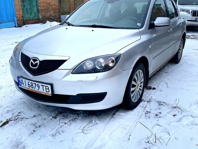 Серый Мазда 3, объемом двигателя 1.6 л и пробегом 320 тыс. км за 3500 $, фото 1 на Automoto.ua