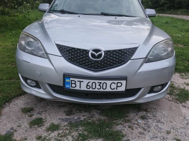 Серый Мазда 3, объемом двигателя 2 л и пробегом 228 тыс. км за 4500 $, фото 1 на Automoto.ua