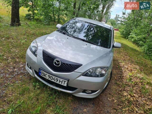 Серый Мазда 3, объемом двигателя 1.6 л и пробегом 350 тыс. км за 4100 $, фото 1 на Automoto.ua