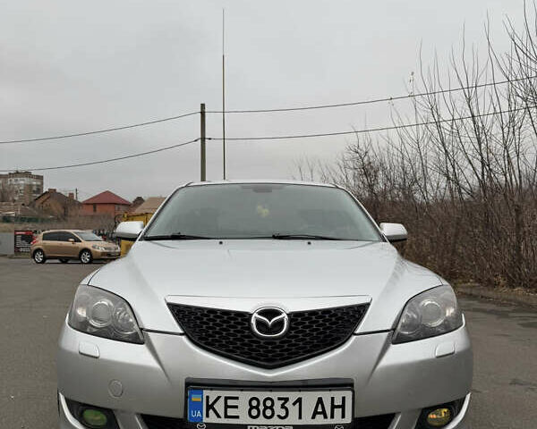 Серый Мазда 3, объемом двигателя 1.59 л и пробегом 235 тыс. км за 4100 $, фото 1 на Automoto.ua