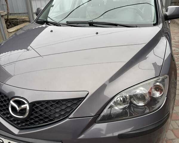 Серый Мазда 3, объемом двигателя 1.6 л и пробегом 905 тыс. км за 5300 $, фото 1 на Automoto.ua