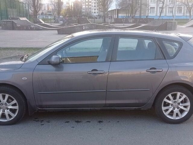 Серый Мазда 3, объемом двигателя 1.6 л и пробегом 204 тыс. км за 4300 $, фото 1 на Automoto.ua