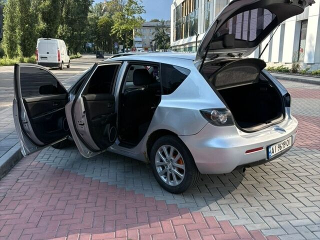 Серый Мазда 3, объемом двигателя 1.6 л и пробегом 252 тыс. км за 3000 $, фото 1 на Automoto.ua