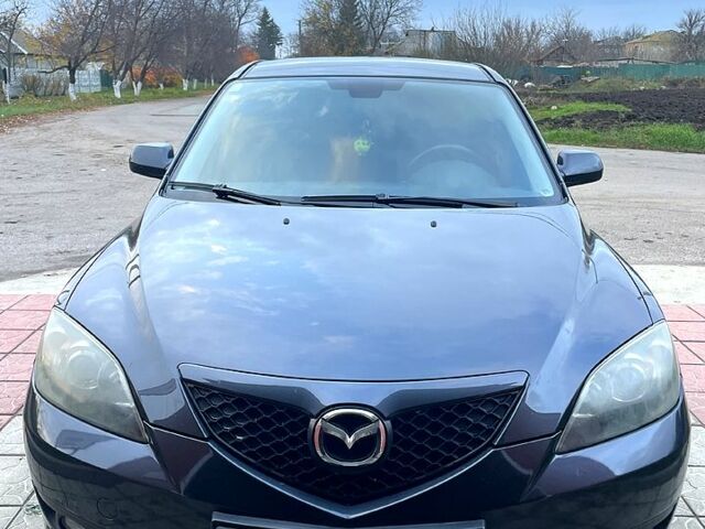 Серый Мазда 3, объемом двигателя 1.6 л и пробегом 192 тыс. км за 5500 $, фото 1 на Automoto.ua
