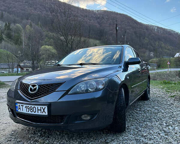 Серый Мазда 3, объемом двигателя 1.6 л и пробегом 248 тыс. км за 4600 $, фото 1 на Automoto.ua