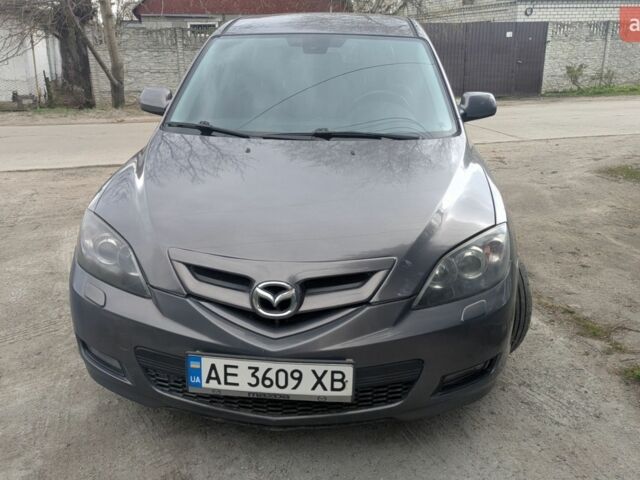 Серый Мазда 3, объемом двигателя 2 л и пробегом 258 тыс. км за 4600 $, фото 1 на Automoto.ua
