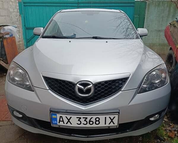 Серый Мазда 3, объемом двигателя 1.6 л и пробегом 195 тыс. км за 5000 $, фото 1 на Automoto.ua