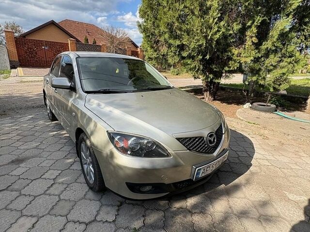 Серый Мазда 3, объемом двигателя 1.6 л и пробегом 202 тыс. км за 5600 $, фото 1 на Automoto.ua