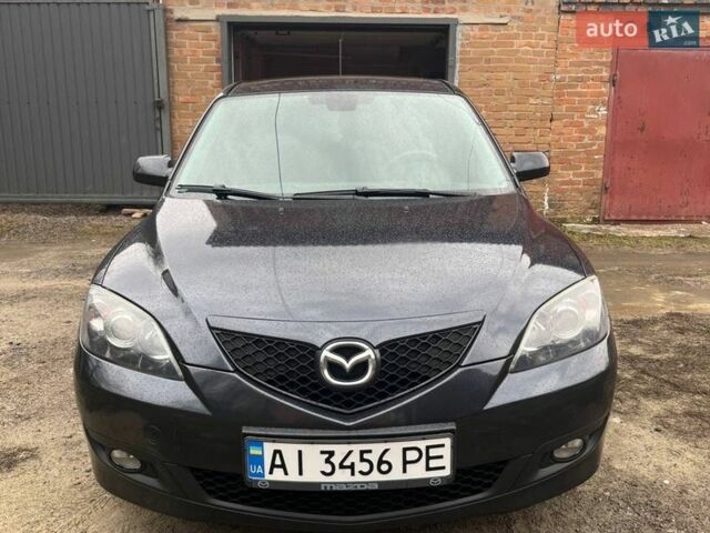 Серый Мазда 3, объемом двигателя 1.6 л и пробегом 153 тыс. км за 6000 $, фото 1 на Automoto.ua