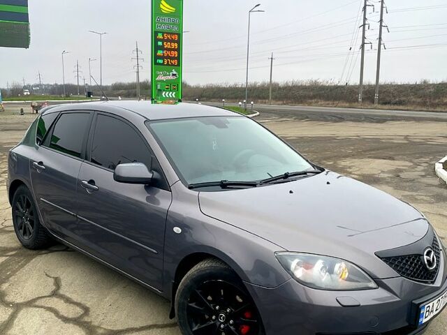 Серый Мазда 3, объемом двигателя 1.6 л и пробегом 290 тыс. км за 4999 $, фото 1 на Automoto.ua