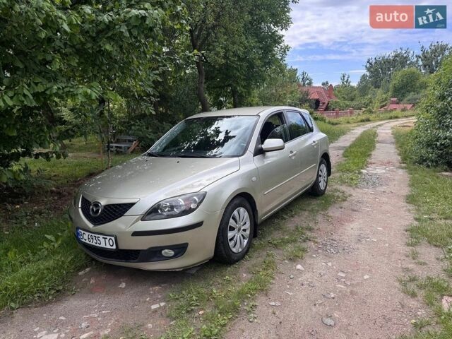 Серый Мазда 3, объемом двигателя 1.56 л и пробегом 234 тыс. км за 4200 $, фото 1 на Automoto.ua