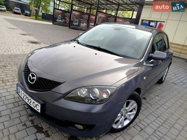 Серый Мазда 3, объемом двигателя 1.6 л и пробегом 269 тыс. км за 4900 $, фото 1 на Automoto.ua