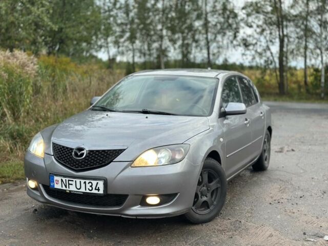 Серый Мазда 3, объемом двигателя 1.6 л и пробегом 240 тыс. км за 2008 $, фото 1 на Automoto.ua
