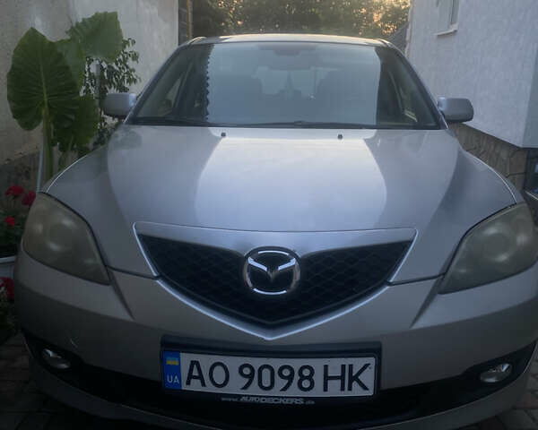 Серый Мазда 3, объемом двигателя 2 л и пробегом 177 тыс. км за 6000 $, фото 1 на Automoto.ua