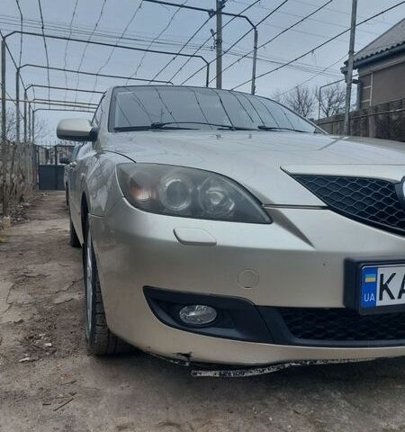 Серый Мазда 3, объемом двигателя 1.6 л и пробегом 240 тыс. км за 5400 $, фото 1 на Automoto.ua