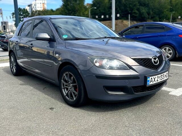 Серый Мазда 3, объемом двигателя 1.6 л и пробегом 220 тыс. км за 5499 $, фото 1 на Automoto.ua