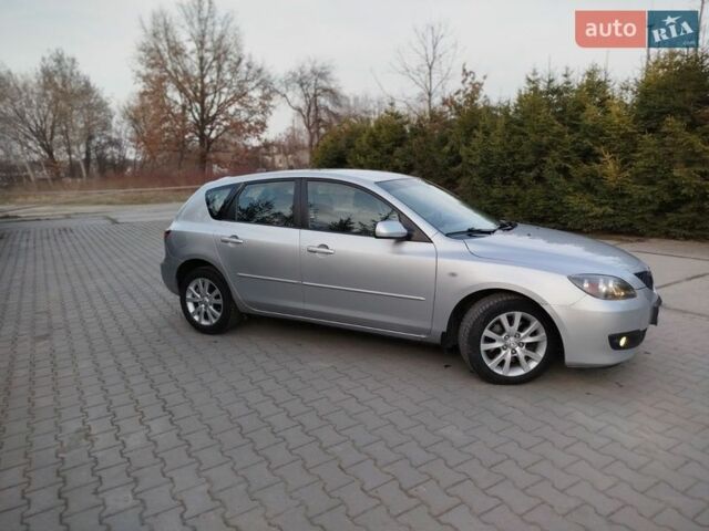 Серый Мазда 3, объемом двигателя 2 л и пробегом 240 тыс. км за 5100 $, фото 1 на Automoto.ua