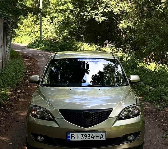 Серый Мазда 3, объемом двигателя 1.6 л и пробегом 169 тыс. км за 4700 $, фото 1 на Automoto.ua