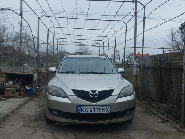 Серый Мазда 3, объемом двигателя 1.6 л и пробегом 247 тыс. км за 5500 $, фото 1 на Automoto.ua