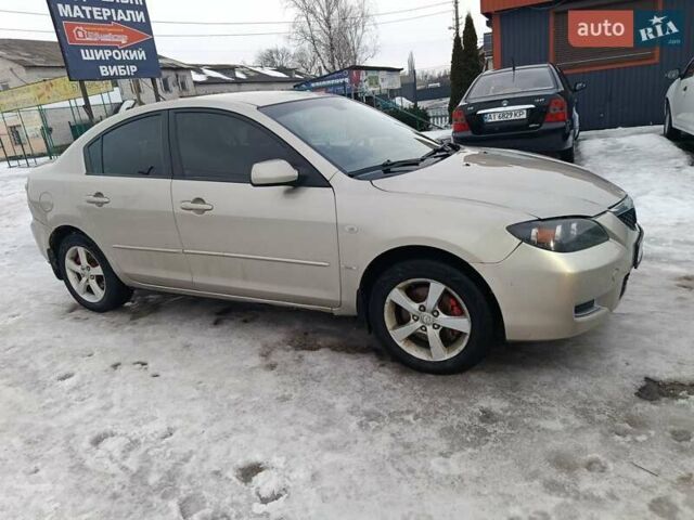 Серый Мазда 3, объемом двигателя 2 л и пробегом 309 тыс. км за 2700 $, фото 1 на Automoto.ua
