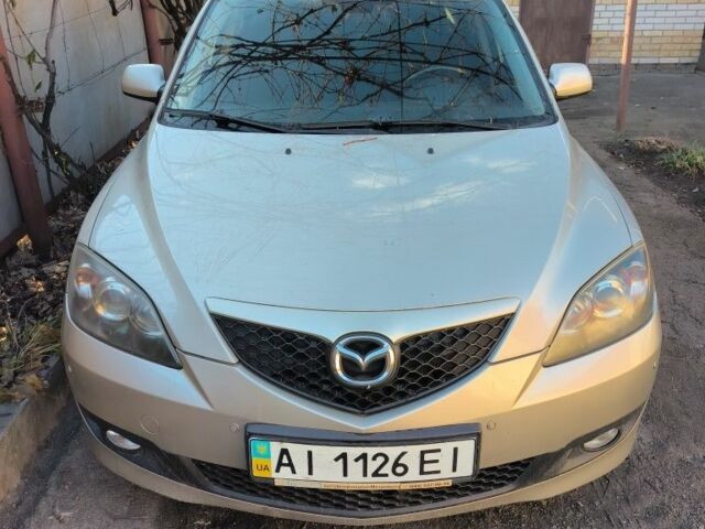Серый Мазда 3, объемом двигателя 1.6 л и пробегом 185 тыс. км за 4200 $, фото 1 на Automoto.ua
